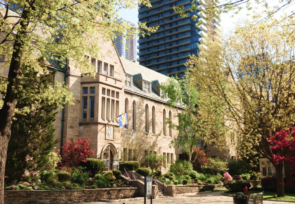 The south facade of Brennan Hall, a building on the St. Michael's campus, in springtime